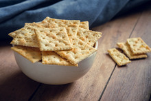 Crispy Crackers With Sesame In Bowl.