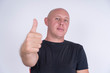 © OlegD - Portrait of an happy bald man, indoors, close up
