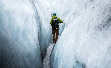 People hike glacier in the summer 