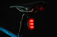 Close-up Of Illuminated Bicycle Tail Light