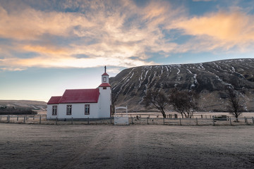 Wall Mural - Beautiful small red roof church in Iceland