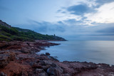 Fototapeta  - Cloudy sunrise on the coast of Oropesa del Mar