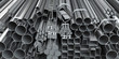 Different metal rolled products. Stainless steel profiles and tubes. in warehouse background.