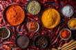 Variety of spices and herbs on kitchen table