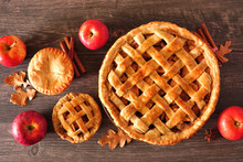 Homemade Autumn Apple Pies, Above View Table Scene With A Dark Wood Background