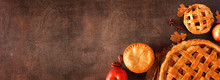 Homemade Autumn Apple Pie Corner Border Banner. Top View Over A Brown Stone Background With Copy Space.