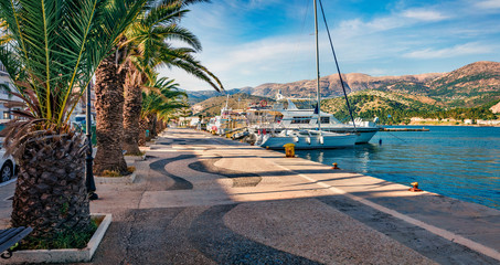 Wall Mural - Picturesque spring cityscape of Argostoli port. Colorful morning scene of Kefalonia island, Greece, Europe. Beautiful seascape of Ionian Sea. Traveling concept background.