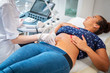 © Nejron Photo - Pregnant woman on utltrasonographic examination at hospital