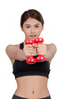 © chaiwat - portrait of pretty sporty girl holding weights