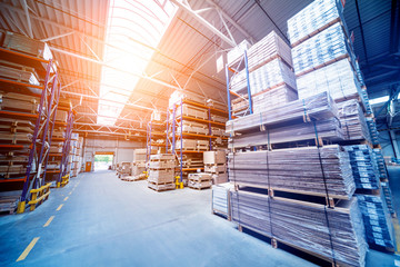 Warehouse industrial company. Commercial warehouse. Crates stacked on the shelves.