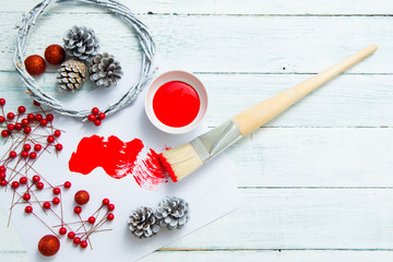 Wall Mural - Christmas decoration making with red paint