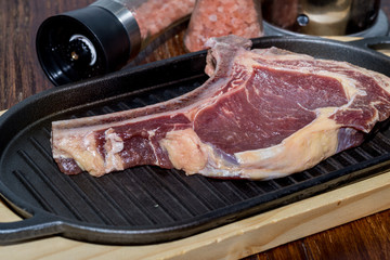 Wall Mural - A fresh steak on the chopping board