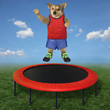 The dog in sportswear is jumping on a red trampoline in the meadow.