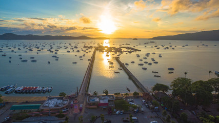 aerial photography at Chalong pier. Chalong bay is the most important marina of Phuket there have 2 piers and customs at pier.. Chalong pier transport tourist to travel around islands in Andaman sea