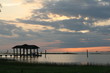 Coastal Boathouse at Sunset