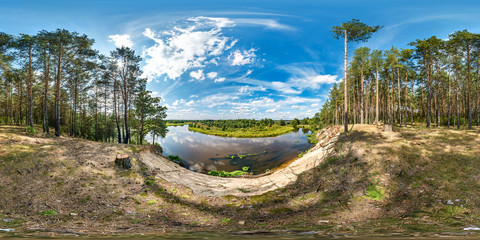 Wall Mural - full seamless spherical hdri panorama 360 degrees angle view with high sandy cliff near the riverbank in a pine forest in equirectangular projection, ready for AR VR virtual reality content