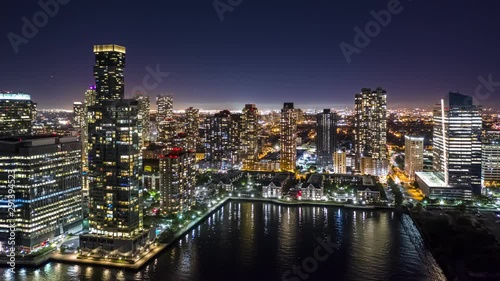 Obraz na plátně  Night Jersey City hyperlapse with panning and rotation motion, above Hudson rive