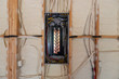 Electrical Circuit Breaker panel in new home construction, with spray foam insulation and negative space
