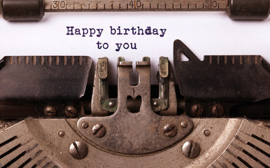 Wall Mural - Happy birthday to you, written on an old typewriter