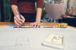 © jat306 - Engineer and Architect concept, Engineer Architects office team working with blueprints