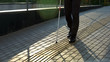 © motortion - Blind man walk along tactile paving, safe urban navigation for visually impaired
