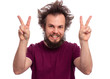 © DenisNata - Portrait of handsome bearded man making Victory gesture, isolated on white background. Happy crazy male smiling and showing victory sign. Caucasian man with funny haircut doing victory symbol.