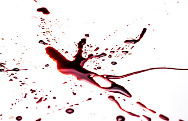 Wall Mural - Blood on a white background. Drops and splashes of blood on a white background.