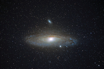 Wall Mural - m31 the andromeda galaxy glowing in the clear starry night sky, cornwall, uk