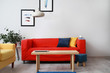 © Pixel-Shot - Stylish interior of living room with bright furniture