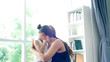 © Kittiphat - Asian Mother comforting her daughter from a minor injury during the morning yoga practicing session