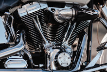 Rivne, Ukraine - September 23, 2019: Harley-Davidson Fat Boy Motorcycle Detail.  Motorcycle Engine Exhaust Pipes. Close Up Of A Classic Motorcycle With Lots Of Chrome Details.