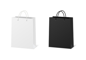 blank shopping paper bags mockup. empty cardboard packets on white background.