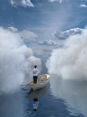 Wall Mural - woman is sailing in a boat through the clouds