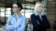 © motortion - Competing women standing in office, colleagues in conflict, leadership challenge