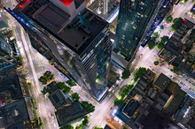 Skyscraper And City Streets At Night