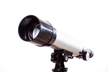 Wall Mural - telescope on a white background laid on wooden board