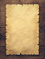 old paper on brown wood texture with natural patterns