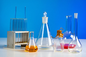 Poster - Medical laboratory. Flasks with reagents. Bacterial studies. Sale of chemicals. Glass beakers. Minorski on the table in the laboratory. Scientific research. Laboratory work. Chemist. Biology.