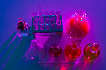 Poster - Flasks top view. Lab. Glass flasks. Laboratory glassware. Laboratory glassware and accessories. Laboratory glassware manufacturing. Samples for research in minzurki. Cylinders. Synthesis.