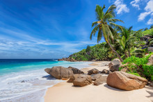 Exotic Sunny Beach And Coconut Palms On Seychelles. Summer Vacation And Tropical Beach Concept.