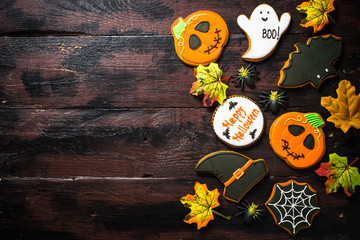 Wall Mural - Halloween Gingerbread Cookies - pumpkin, ghosts, bat, on woden table.