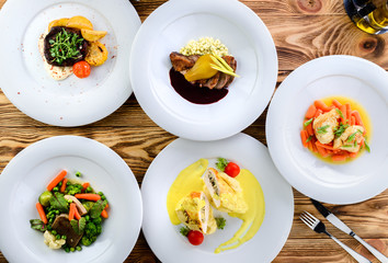 Sticker - set of prepared dishes on the table of meat and vegetables