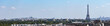 Panoramic skyline of Paris with the Eiffel tower, Montmartre and Arc de Triomphe. Shot from Parc de Saint-Cloud - France.