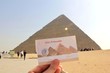 Ticket in a hand to Giza pyramids in Egypt 