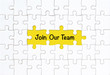 © Monster Ztudio - Join our team concept. White jigsaw puzzle with word and yellow background