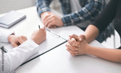 Fotomural Doctor writing prescription and treatment plan to patients