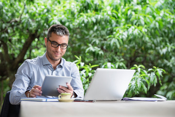 Businessman working on terrace