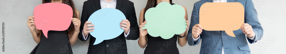 People are holding colorful Speech Bubbles. - obrazy, fototapety, plakaty 