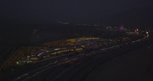 Helicopter Aerial Of California Freeway Leading Up To Morongo Casino, Night