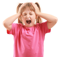 Wall Mural - Portrait of angry little girl on white background